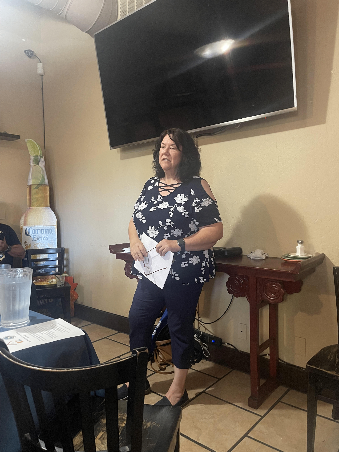 Cami speaking at a Think Local First gathering at Mijos Taqueria